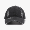 Distressed black denim baseball cap with vintage ripped details and curved brim style - Black
