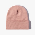 Minimalist knit beanie in soft dusty pink with thick ribbed fold for winter warmth - Light Skin Pink