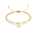 Baroque natural pearl bracelet with 18K gold beads and letter M charm on woven cord - Letter M