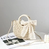 Mini round white woven straw bag with lace bow decoration and a gold chain strap - Beige