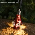 Red light-up Christmas bulb ornament with Merry Christmas text and reindeer antlers - Red Letter