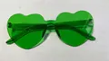 Vibrant emerald green heart shaped rimless sunglasses in transparent jelly style - Cyan