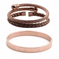Detail of rose gold stainless steel bracelet set with Roman numeral engravings - Three-Piece Set / Rose Gold