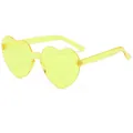 Frameless heart shaped sunglasses in transparent yellow jelly color with integrated design - Yellow