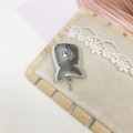 Polished silver alloy hair clip with irregular curved design on a plush beige background - Standard / Silver