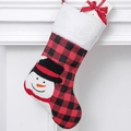 Christmas stocking with red and black plaid pattern, plush cuff, and embroidered snowman - Snowman