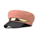 Close-up of pink canvas newsboy hat with black leather brim and golden metal band - Orange (Gold Trim)