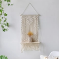 Bohemian beige macrame wall hanging with wooden shelf and fringe details - Style m0674 (Beige Macrame Wall Hanging)