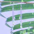 Elegante lange Silber-Quastenohrringe mit schillernden AB-Kristalltropfen und Wellenketten - AB Kristall Quaste Haken Ohrringe / AB Silber