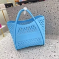 Sky blue hollowed-out jelly tote bag featuring a diamond mesh pattern and dual handles - Sky Blue