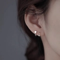 925 silver stud earrings with stars and beads on an ear model in silver finish - White Gold Color-Star Style (Single-Left Ear)