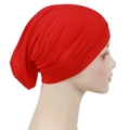 Close-up of bright red modal hijab cap with elastic pleated texture on a mannequin - One Size / Red