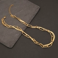 Dual-layered golden necklace featuring paperclip and snake chains on a dark stone background - Gold Double Layer Paperclip and Snake Bone Chain (5#)
