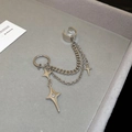 Detailed close-up of silver star zircon ear cuff with double chains on velvet tray - Star Connected Tassel Ear Cuff (8#)