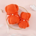 Pair of orange coral fleece towels folded as bears with red ribbons for wedding gifts - 20x10cm / Orange Pearl Bear