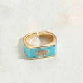Adjustable gold band ring with sky blue enamel and sparkling evil eye crystal design - Blue