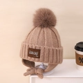 Gorro de punto marrón oscuro para niños con pompón de pelo y orejeras térmicas - Niños aprox 3-10 años / Caqui