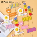Colorful 10-piece birthday cake topper set with bear and rainbow banner charms - HBD Smiley Face Set of 10