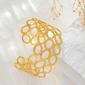Elegant gold-plated wide open bangle with geometric hollow oval honeycomb pattern design - 1079-Honeycomb Geometric Ellipse Hollow Cuff