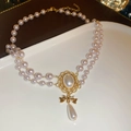 Double-layer pink-purple pearl necklace with bowknot and teardrop pendant - White Bowknot Pearl Necklace