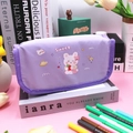 Close-up of a purple high-capacity pencil case with cute rabbit and strawberry prints - Purple