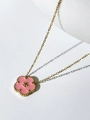 Pink enamel flower pendant with golden star detail and beaded edge on a gold chain - Flower