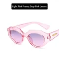 Occhiali da sole cat-eye irregolari con montatura rosa chiaro e lenti sfumate - Rosa Chiaro