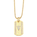 Detail of gold rectangular pendant necklace with silver letter V and pavé micro-inlay - Letter V