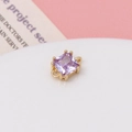 Macro shot of purple faceted square zircon pendant with gold double-loop connectors - Light Purple