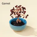 Garnet crystal money tree with copper wire branches and a blue ceramic pot base - Garnet (Blue Ceramic Cup)