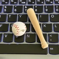 Mini baseball keychain set with white ball and natural wooden bat on laptop keyboard - Medium Bat Charm Piece / White