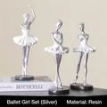Set of three silver resin ballet dancer sculptures in elegant poses on black bases - Silver Ballet Girls Set
