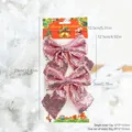 Pink sequin Christmas bow set of 2 on a white tree background with Merry Christmas card - 2 Pack Pink