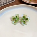 Elegant green ceramic flower cluster earrings with crystals and pearls on white tray - Crystal Gradient Flower / Green