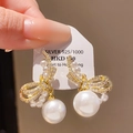 Macro shot of 925 silver gold-plated bow pearl earring with sparkling rhinestones - Gold Dainty Bow Pearl (26#)