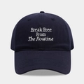 Macro shot of navy cotton baseball cap featuring white letter embroidery on a curved brim - Navy Blue