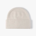 Winter minimalist knitted beanie in creamy beige color with stylish folded cuff detail - One Size / Beige