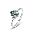 Macro shot of a pear-shaped green moss agate ring with small diamonds on silver band - US 6 / Pear Shaped Cut Style (RG016479) / Silver