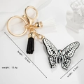 Goldener Schmetterling Schlüsselanhänger mit Quasten, Maße 10,4 cm mal 5,5 cm - Schmetterling Design