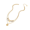 Gold double-layered necklace featuring blue evil eye charms and a four-leaf clover pendant - Double Layer Evil Eye Clover Necklace