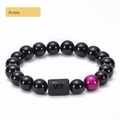 Aries zodiac bracelet with black onyx beads and magenta tiger eye stone detail - Aries
