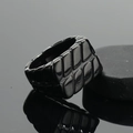 Minimalist black stainless steel men's ring with textured geometric leaf pattern design - Black