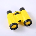 6x30 yellow and black plastic binoculars for kids in a top-down view for children toy - 6x30 With Compass Color Box / Yellow