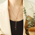 Rose gold adjustable snake chain necklace with pull-ball clasp on a professional model - Titanium Steel / P554-Rose Gold Necklace