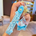 Blue unicorn liquid star keychain with glitter, bell and Happy Moments wrist strap - Blue-Star Unicorn