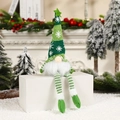 Lighted Christmas gnome doll with long legs and green striped hat on festive background - Long Legs Green With Light
