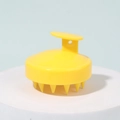 Bright yellow silicone scalp massager brush with ergonomic handle for hair cleaning - Yellow