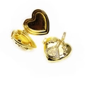 Detail of gold heart locket opening with religious relief and sparkling crystal inlay - Virgin Mary Style