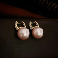 Macro view of pink pearl earrings with gold-plated zircon pavé hoops on leather background - Real Gold Plated Ear Buckle / Champagne