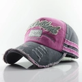 Detailed view of vintage washed baseball cap with frayed edges and retro embroidery - Pink + Grey